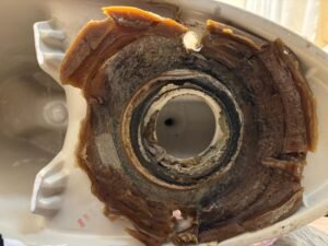 Broken toilet bottom